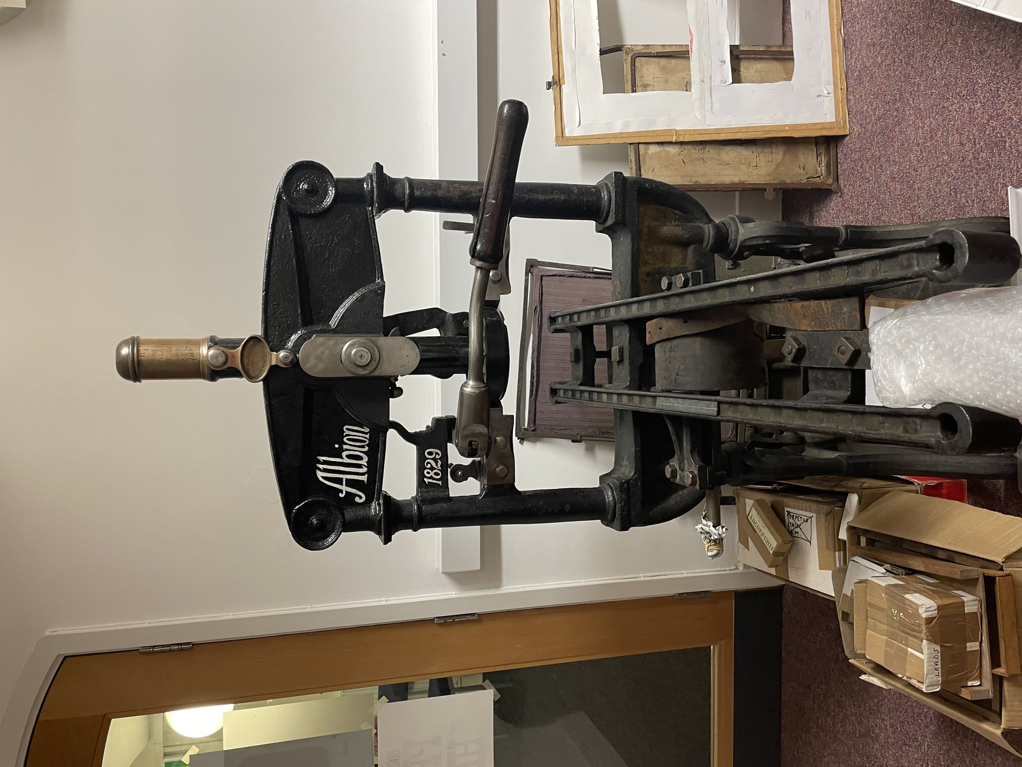 A photograph of a printing press owned by the Bristol Common Press.